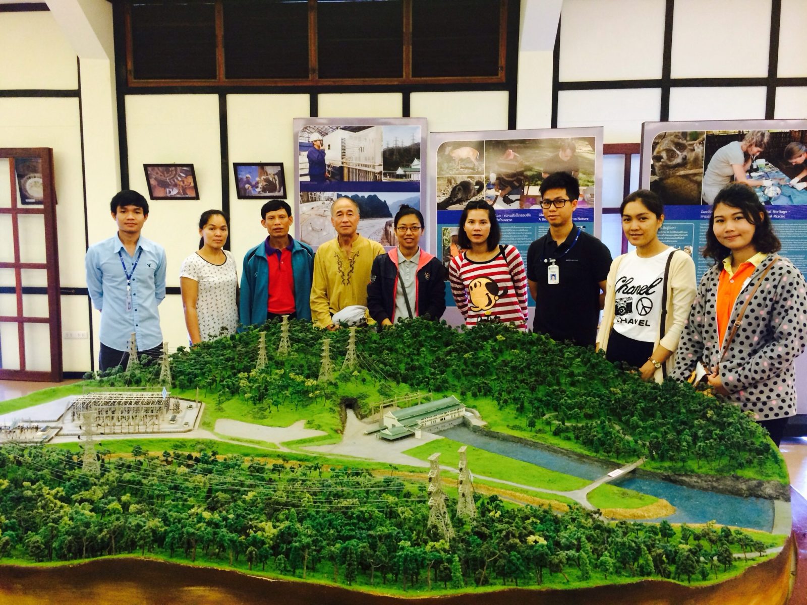Participants look at the 3D representation of the project